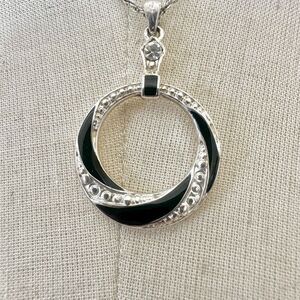 Avon silver tone and black circle pendant necklace